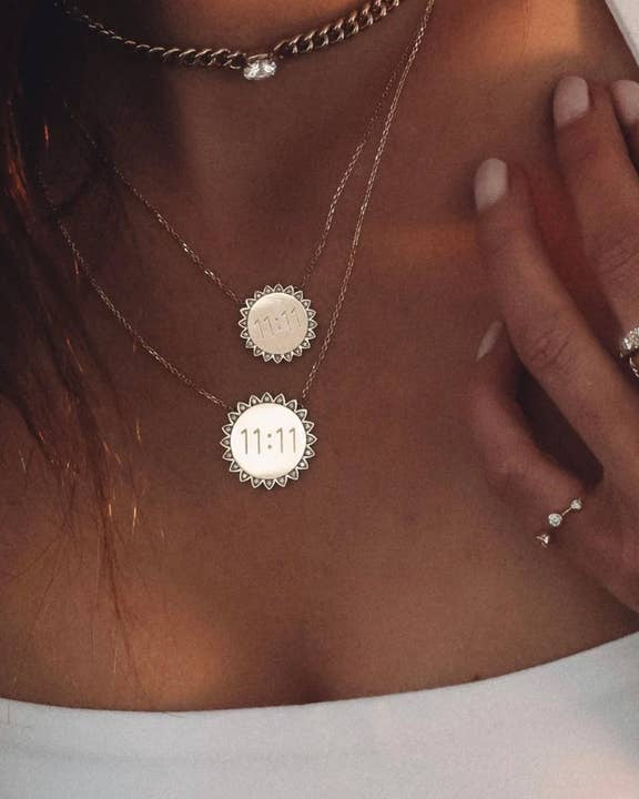 52291d7a0b1213677ad1ade7a4e4dc8dcef5e97a8c909d5007f689f4b87e86d7_0f4d56f1-5931-4461-9fc7-4108e2aac7d4.jpg 11:11 Sunshine Sun Pendant Necklace 14K Gold Steel Crystal