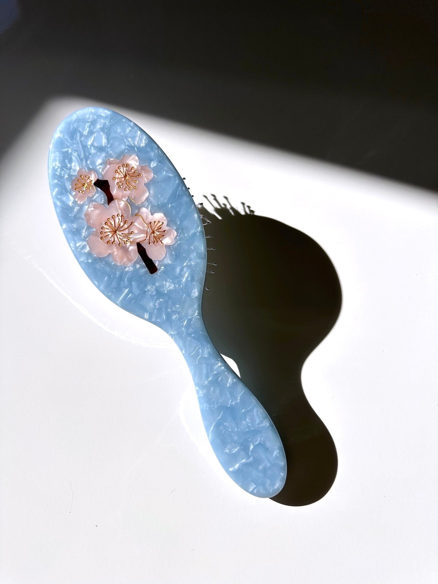 ee8b9fada0b6dace203df77c22416d01eb5a8597afa9a4f0bb63dfff97192342.jpg Hand-Painted Cherry Blossom Acetate 2-1 Hair Brush