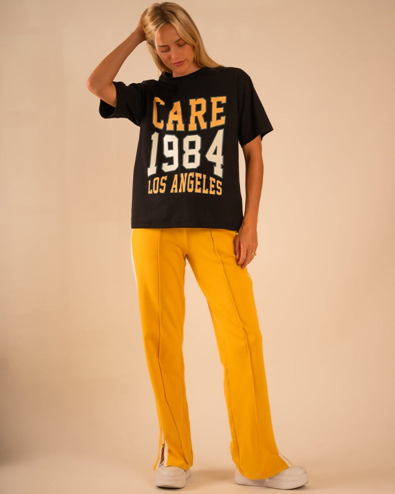 marlietee-1984.jpg Marlie Tee CARE 1984 Black